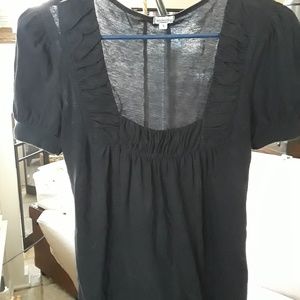 Top with embellished neckline